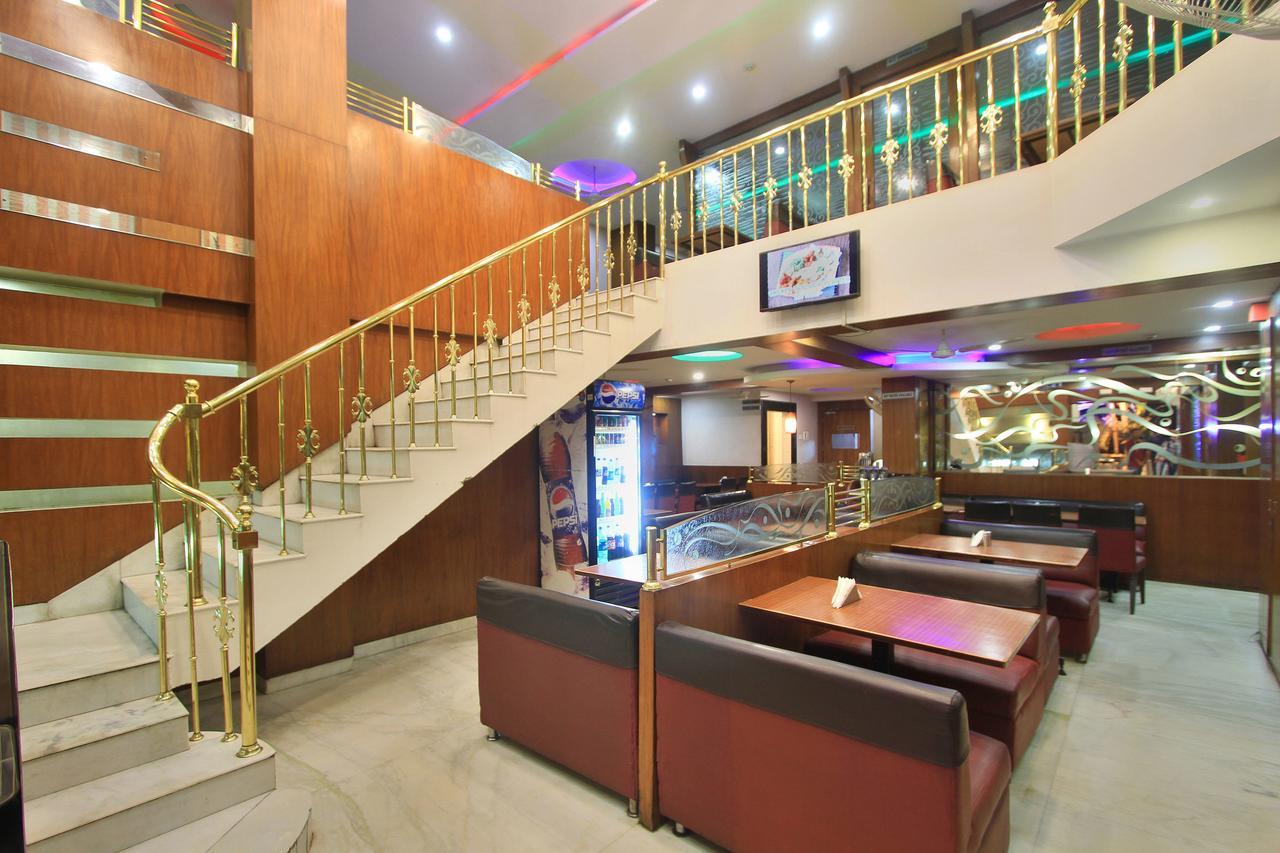 Oyo 6110 Thalassa Suites บังกาลอร์ ภายนอก รูปภาพ