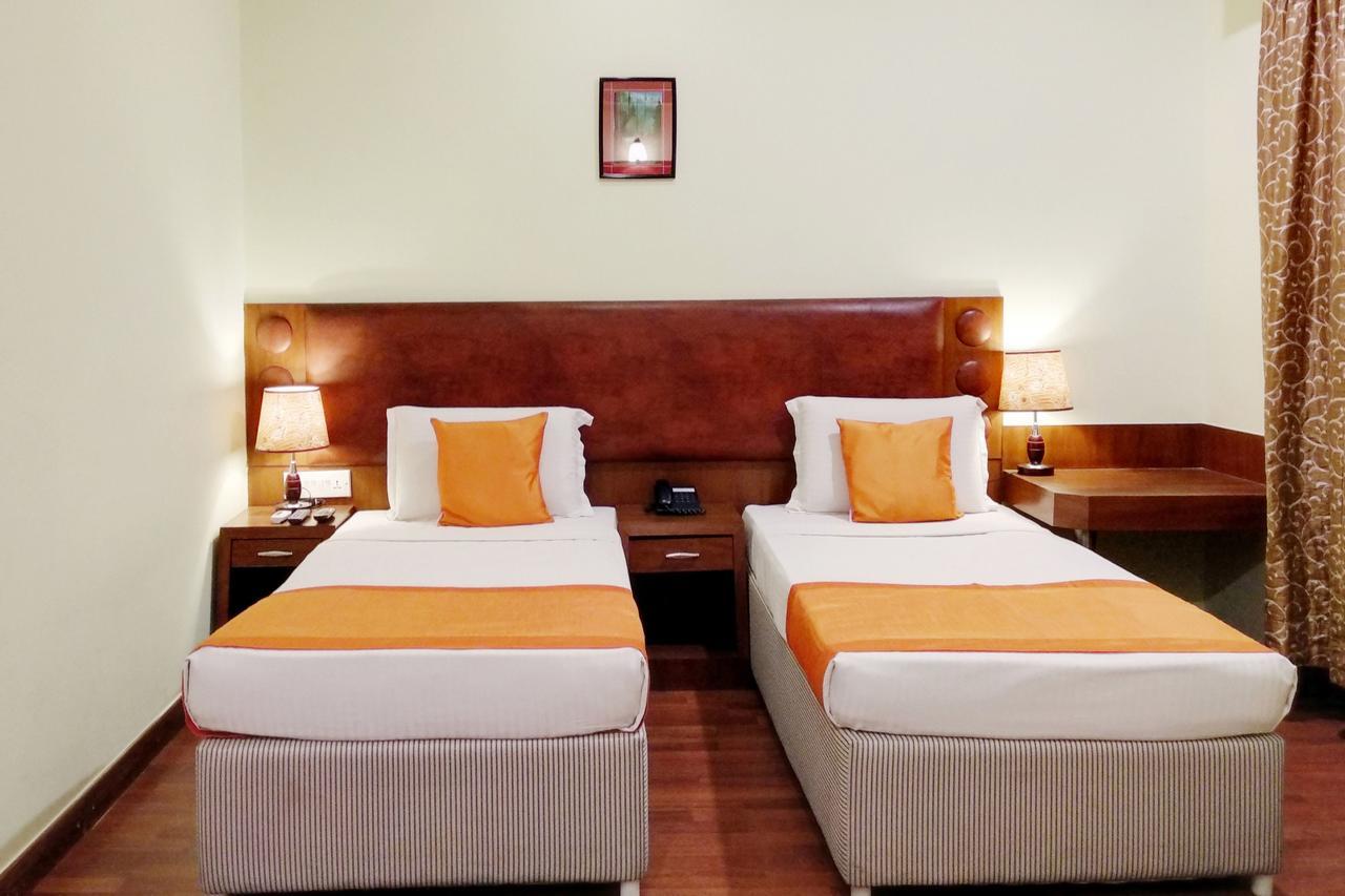 Oyo 6110 Thalassa Suites บังกาลอร์ ภายนอก รูปภาพ