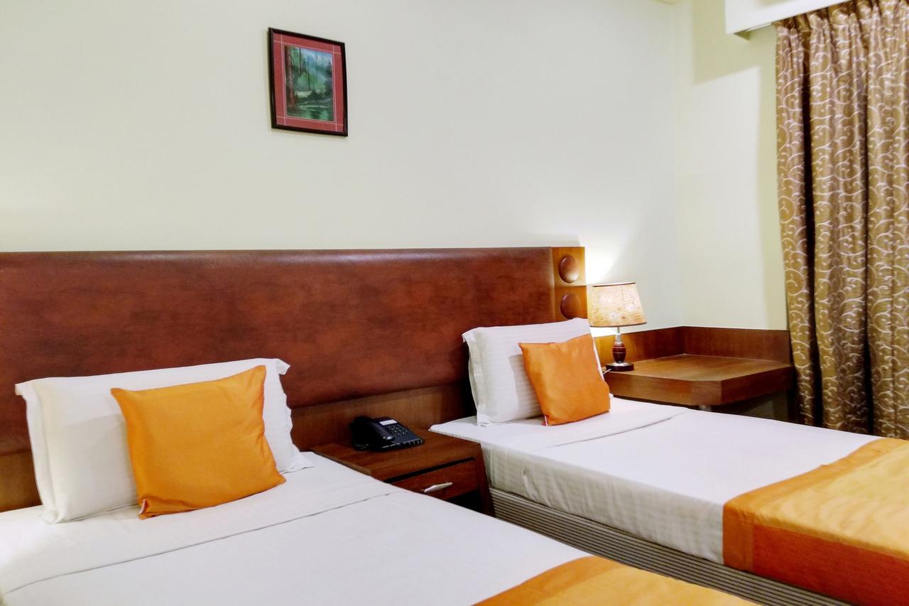 Oyo 6110 Thalassa Suites บังกาลอร์ ภายนอก รูปภาพ